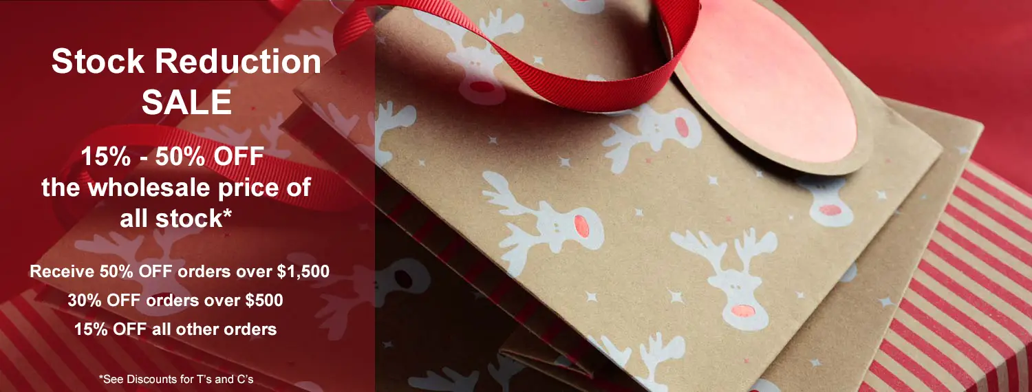 Stock Reduction Sale banner over rudolph gift bags