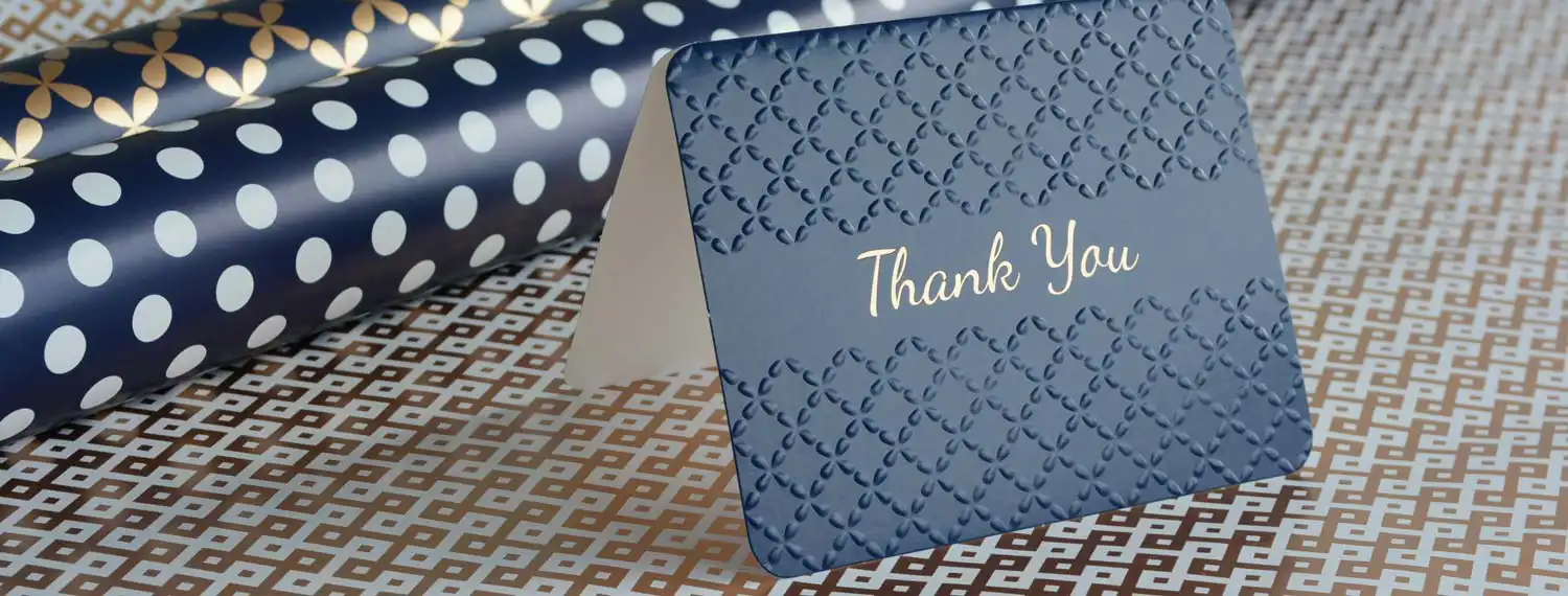 Thank you card in navy and gold script
