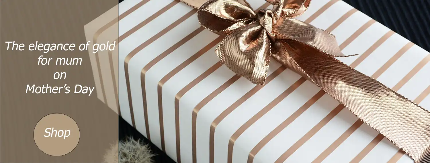 Elegant gold wrapping including ribbon and wrapping paper