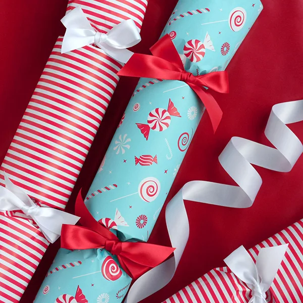 Jumbo bonbons made from wrapping paper in 2 different designs - a thin red stripe and also a turquoise/red candy cane design.